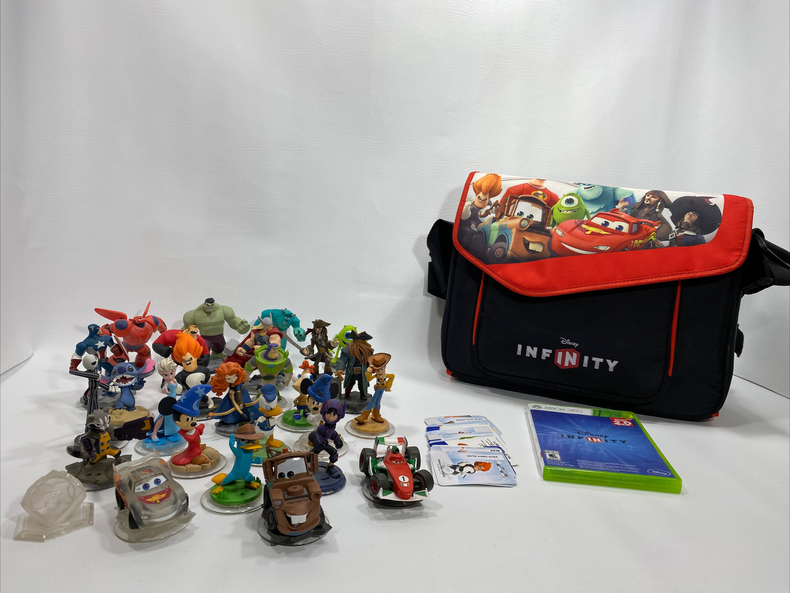 Disney Infinity Lot Of 26 Figures, XBOX Game 2.0, Roll Out Shoulder Bag, Cards