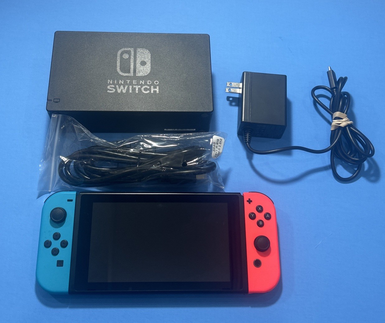 Nintendo Switch with Neon Blue and Neon Red Joy Con Bundle Complete With Games