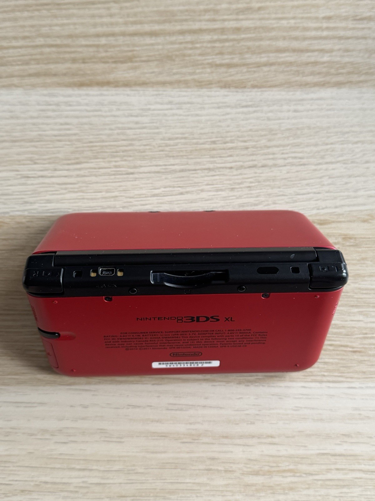 Nintendo 3DS XL Red/Black – Includes Stylus, Case + 3 Games