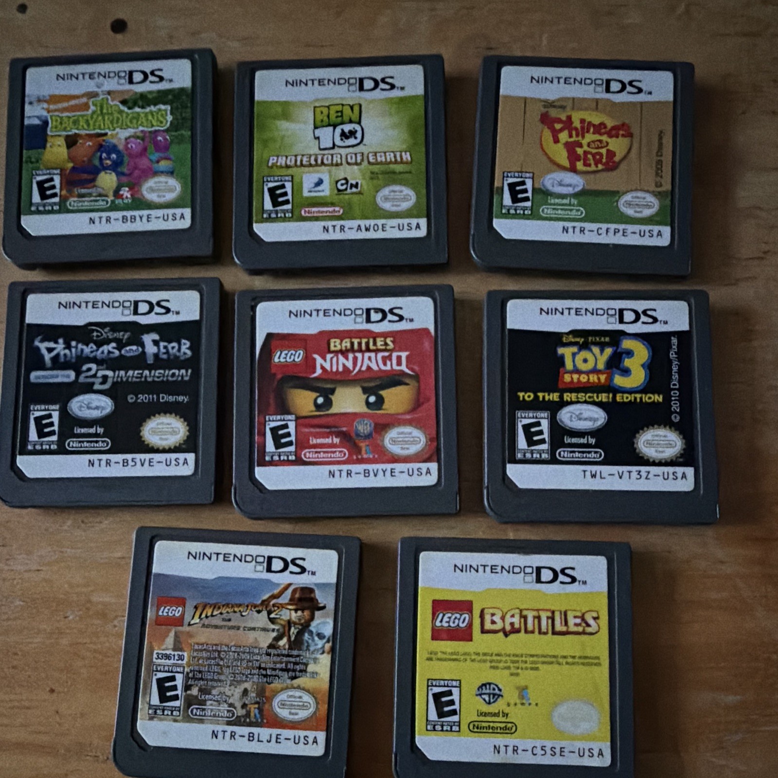 Nintendo DS Game Lot (8): Toy Story 3, Ben 10, Phineas Ferb, LEGO Ninjago