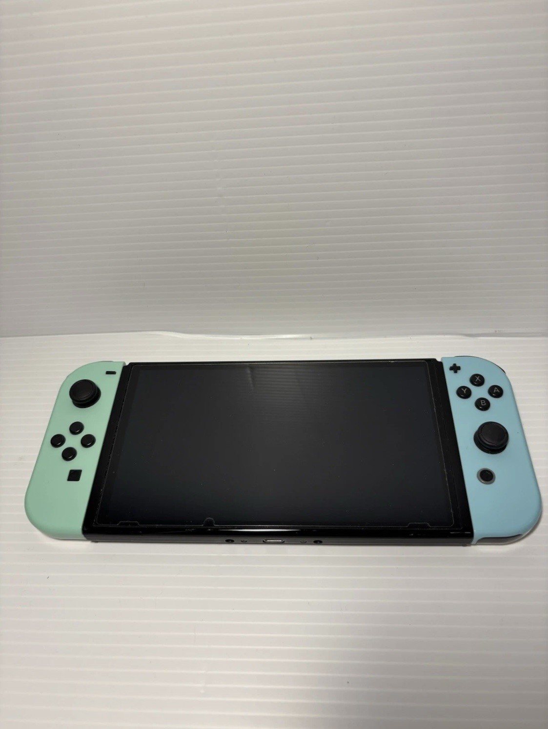 Nintendo Switch OLED – Tested w/ Screen Protector, Case, & green/blue Joy-Cons