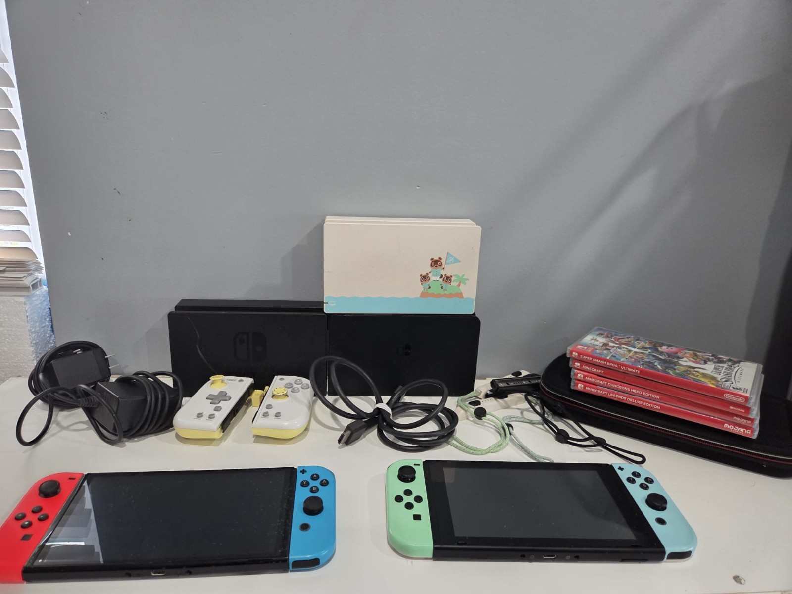 Nintendo switch oled and regular bundle with many accessories working