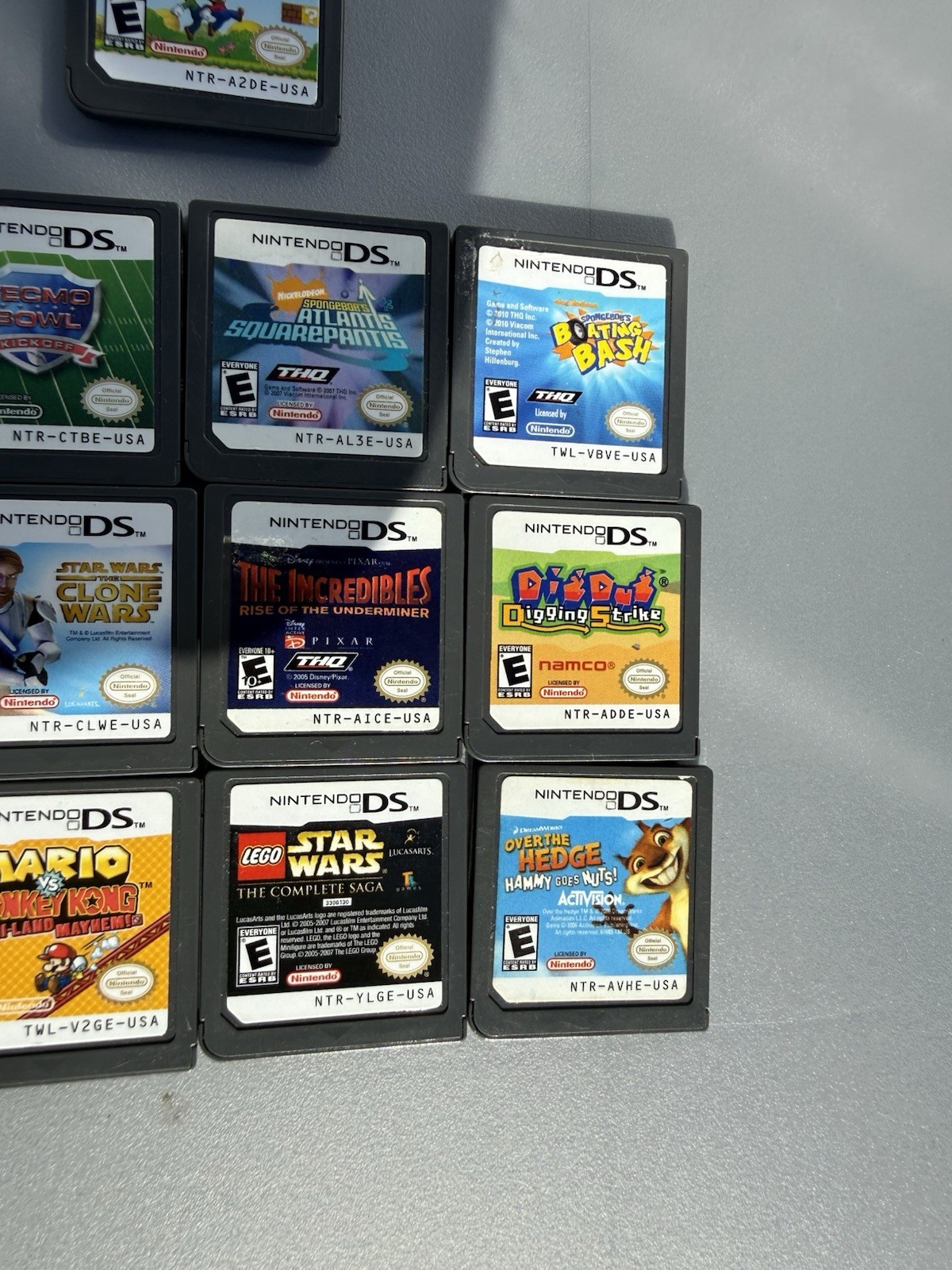 Nintendo DSi Lite Blue Console + Game Cartridge Lot (Mario, Star Wars, Batman)