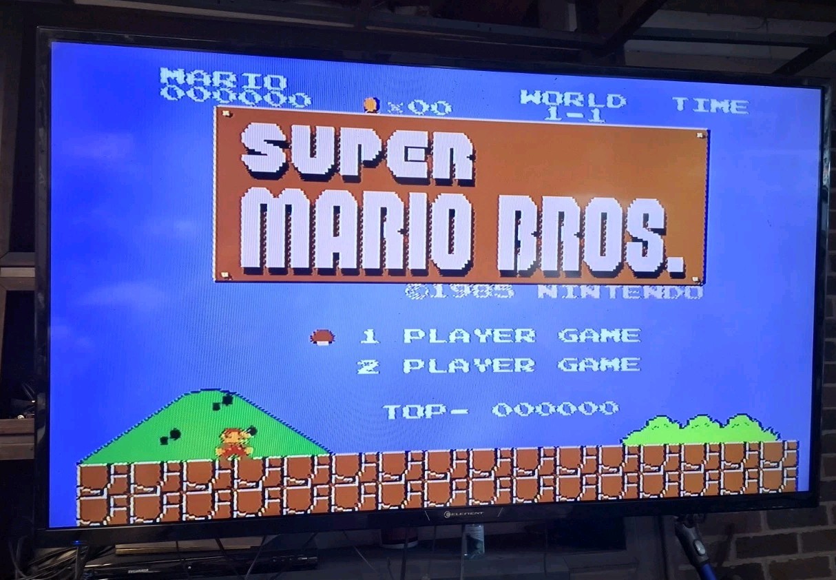 Nintendo NES Console Bundle OEM Tested Cleaned 2 Controllers Zapper Gun 4 Games