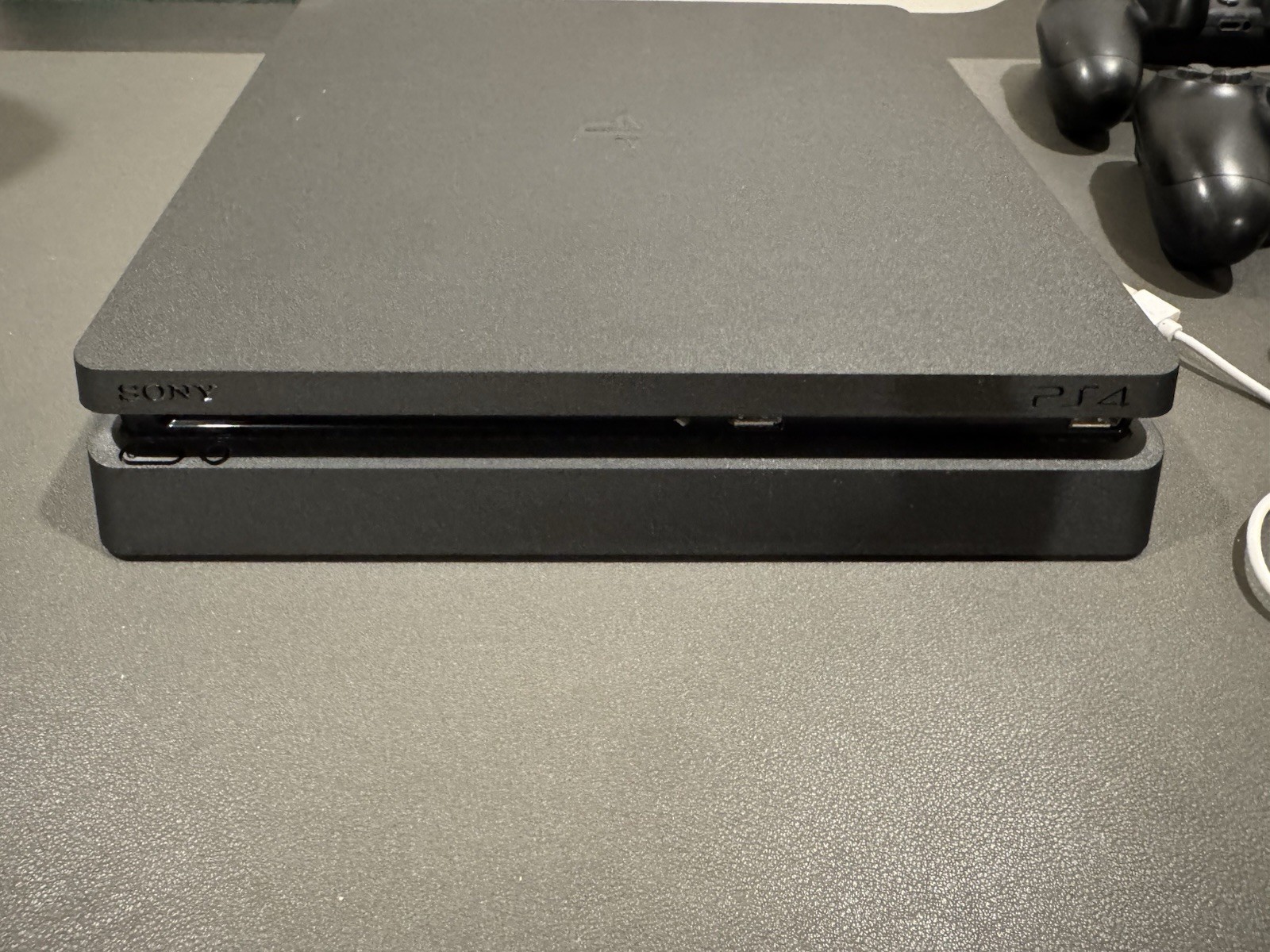 Sony PlayStation 4 Slim 1TB Black Console with 2 Controllers and Cables