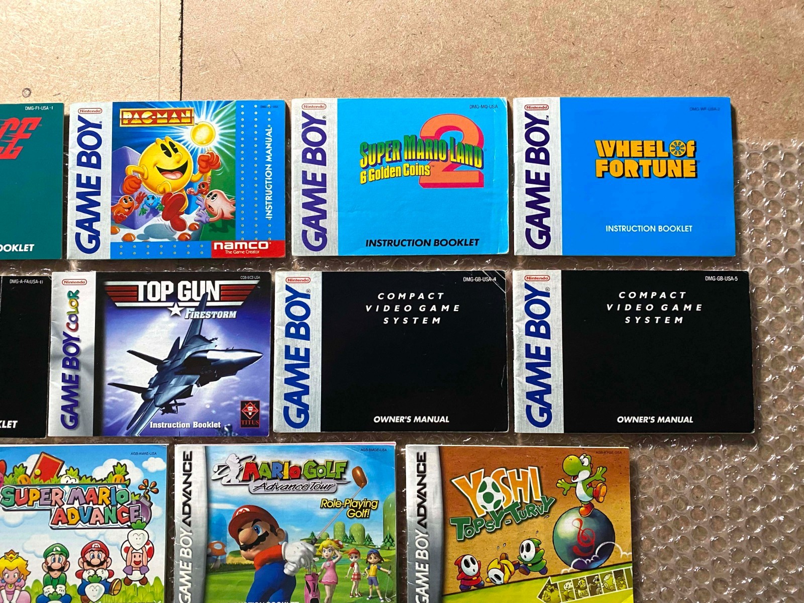 LOT OF 13 Game Boy/GBC/GBA Manuals (Mario Yoshi Pac-Man Bust-A-Move Top Gun)