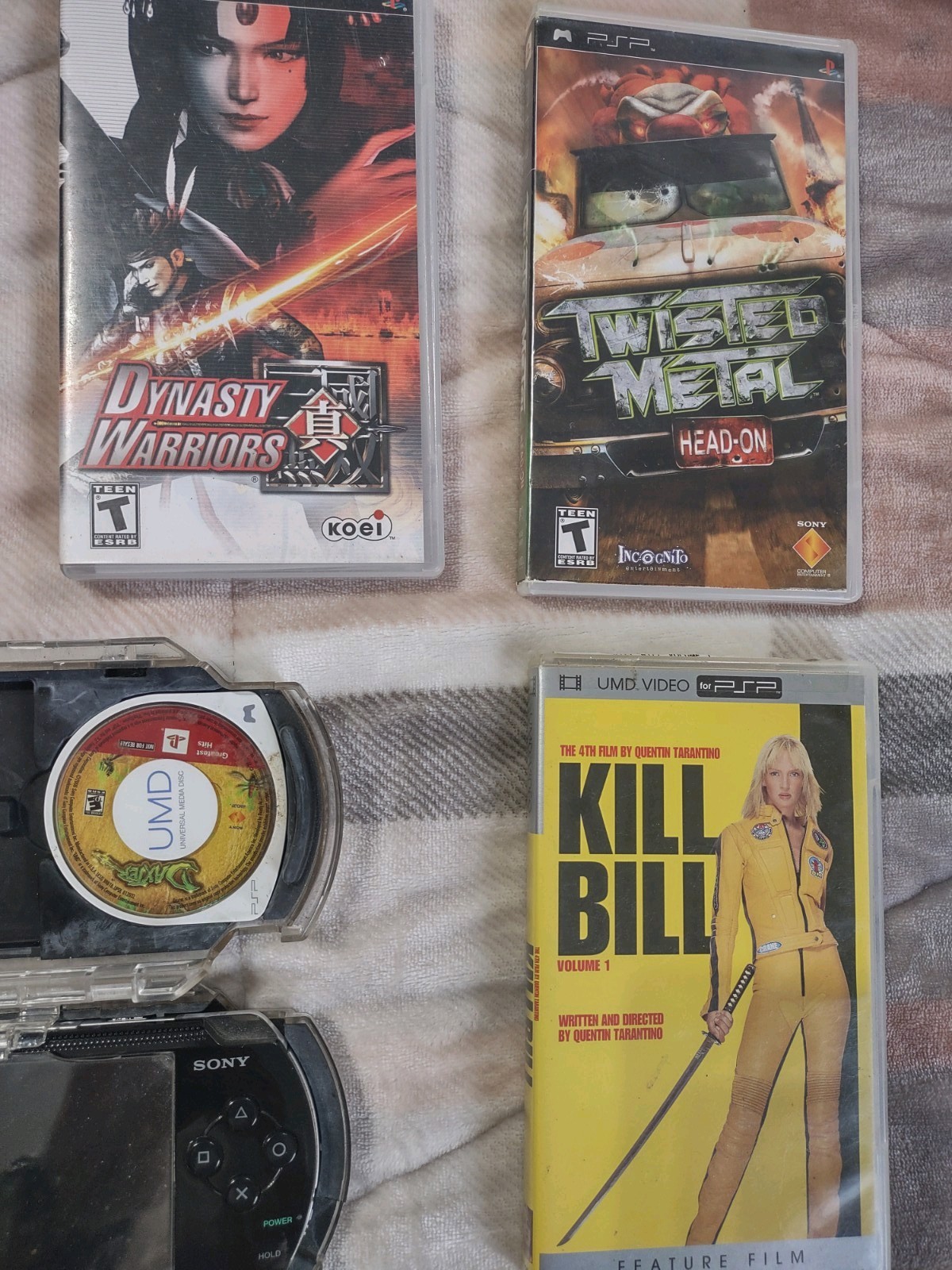 Sony PlayStation PSP-1001 w/Clear Travel Case, Charger, Memory, 8 games 1 movie