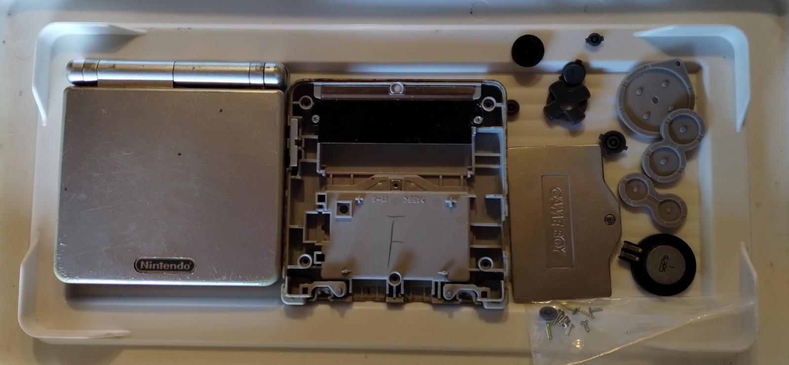 Nintendo Gameboy Advance SP AGS-001 Silver Handheld System FOR PARTS/REPAIR