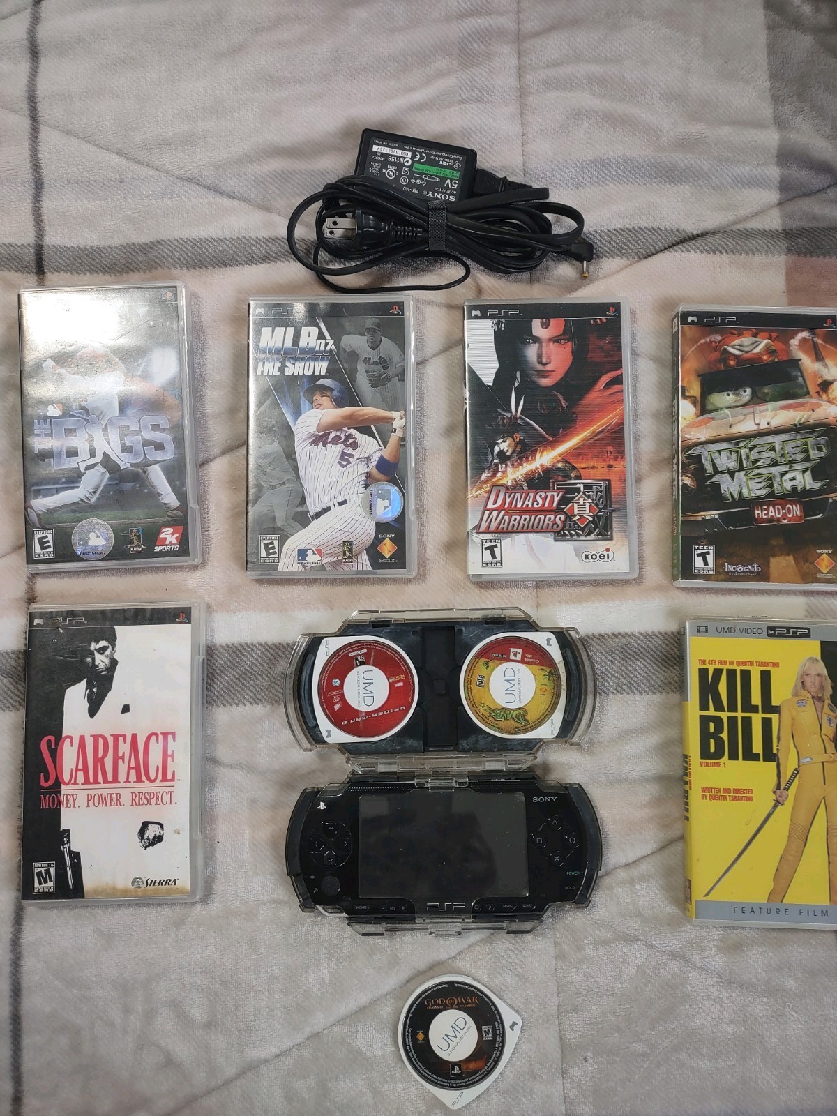 Sony PlayStation PSP-1001 w/Clear Travel Case, Charger, Memory, 8 games 1 movie