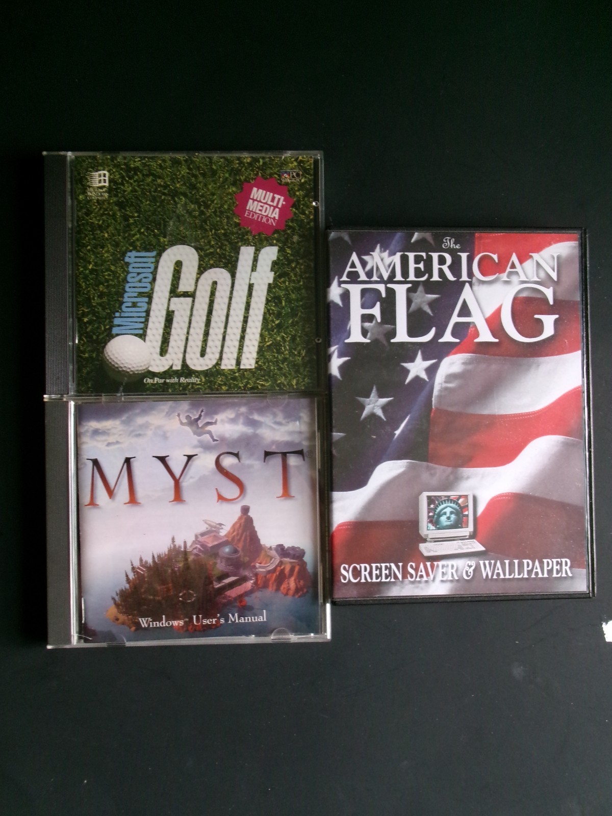 Windows 95 Games / Software Lot- Myst – Microsoft Golf – Flag Screensavers