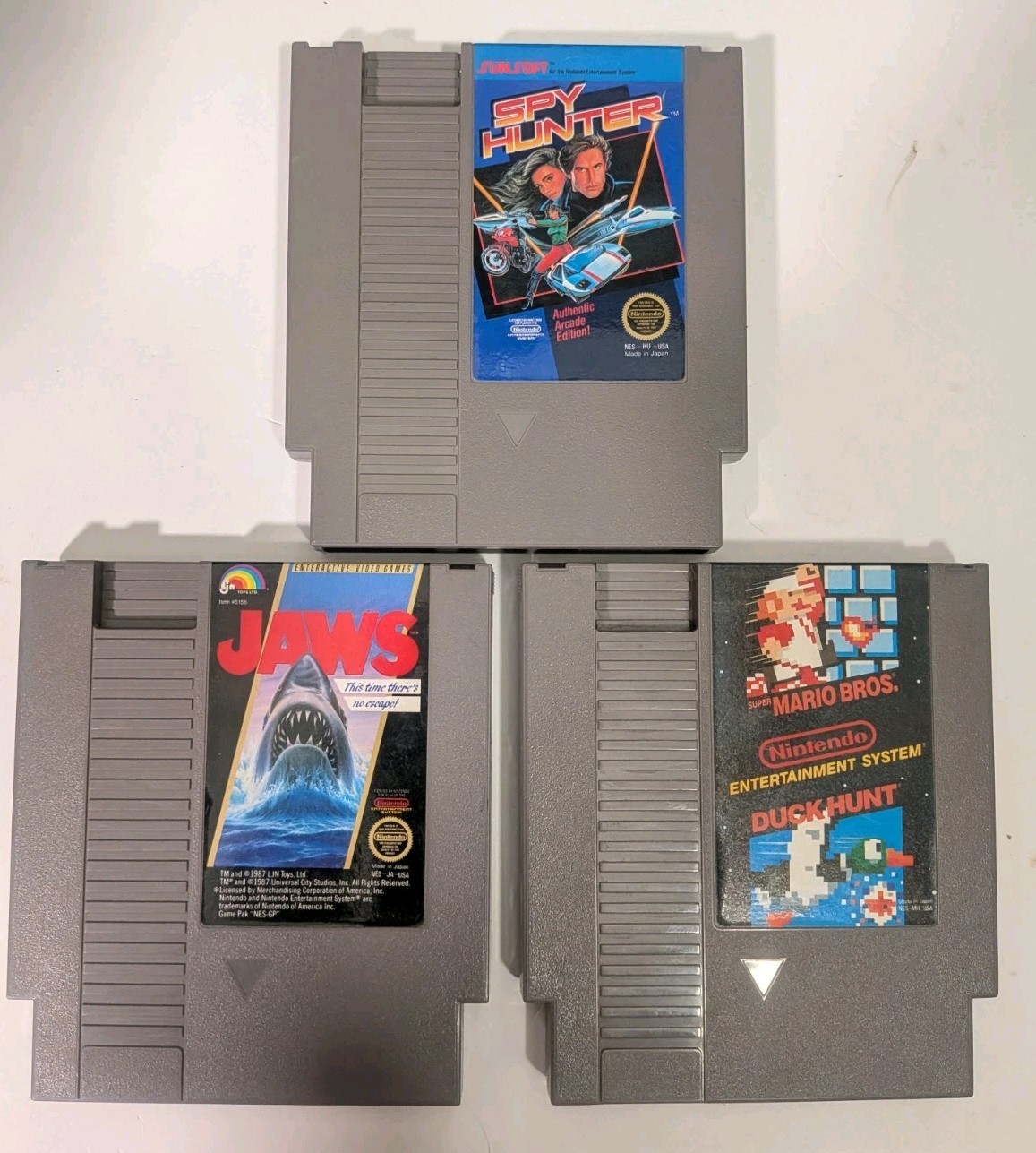 Nintendo NES Game Lot (Bundle of 3): Mario/Duck Hunt, Jaws, Spy Hunter – Used