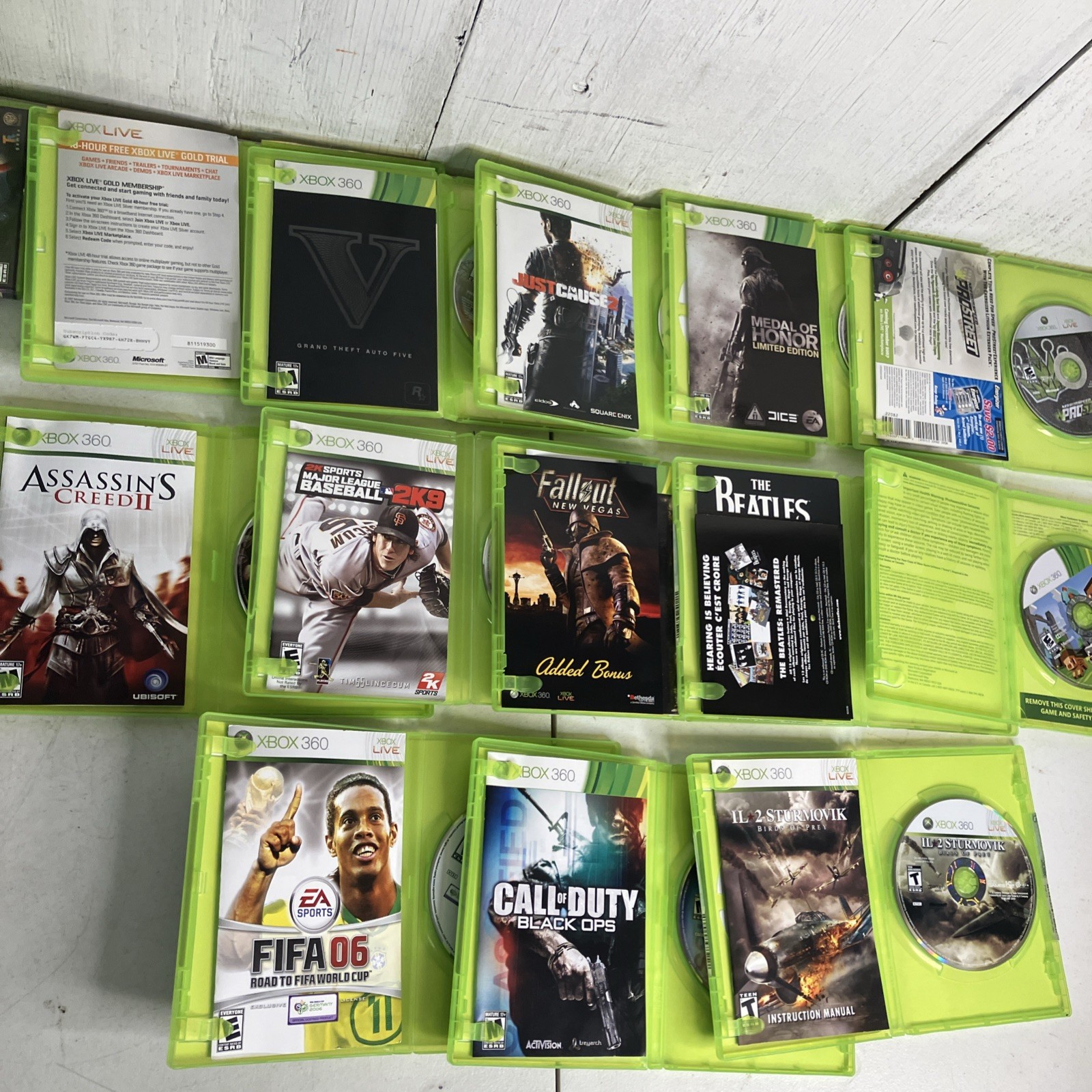 Microsoft Xbox 360 E 500GB 1538 Bundle 2 Controllers 25 Games GTA V HALO FALLOUT