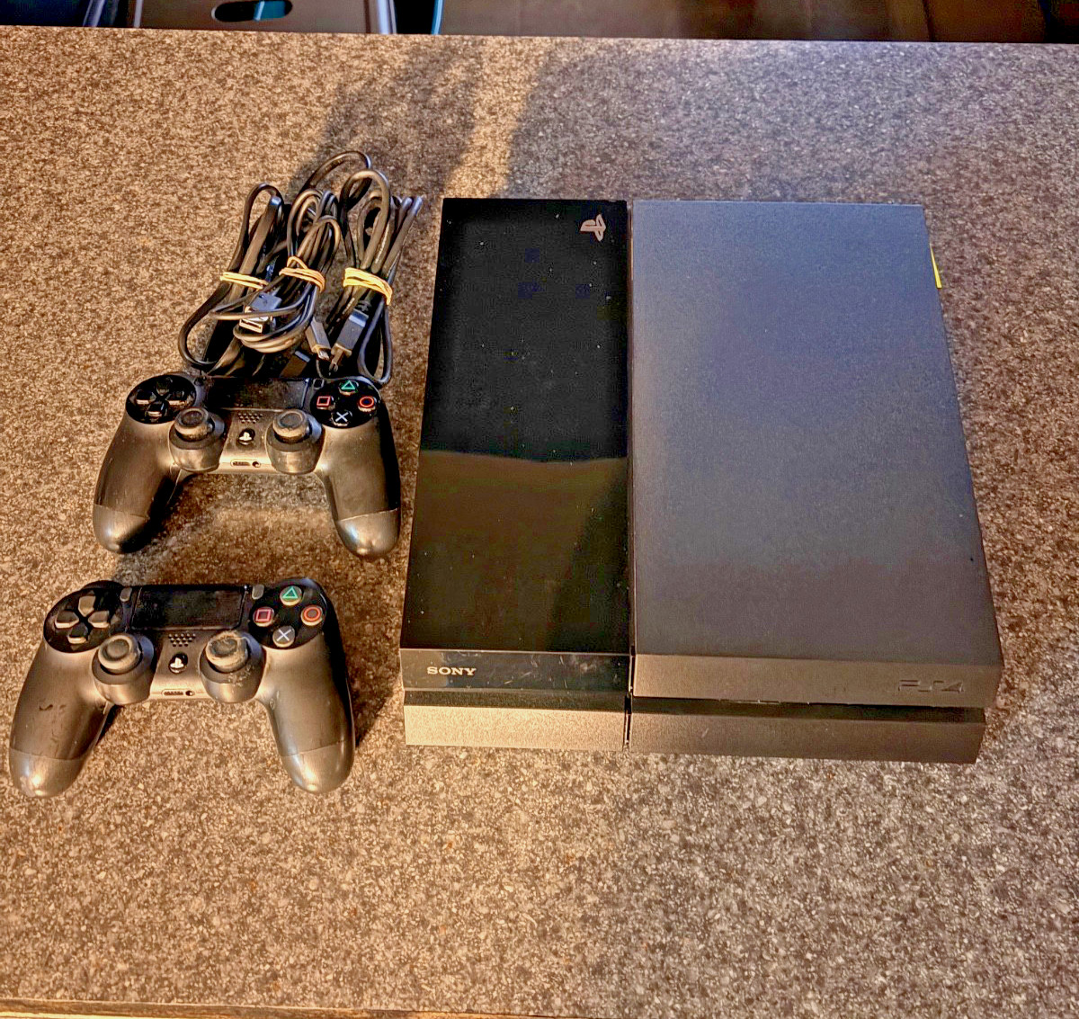 Sony Playstation 4 console 500GB w/ 2 dual shock controllers/cords works great