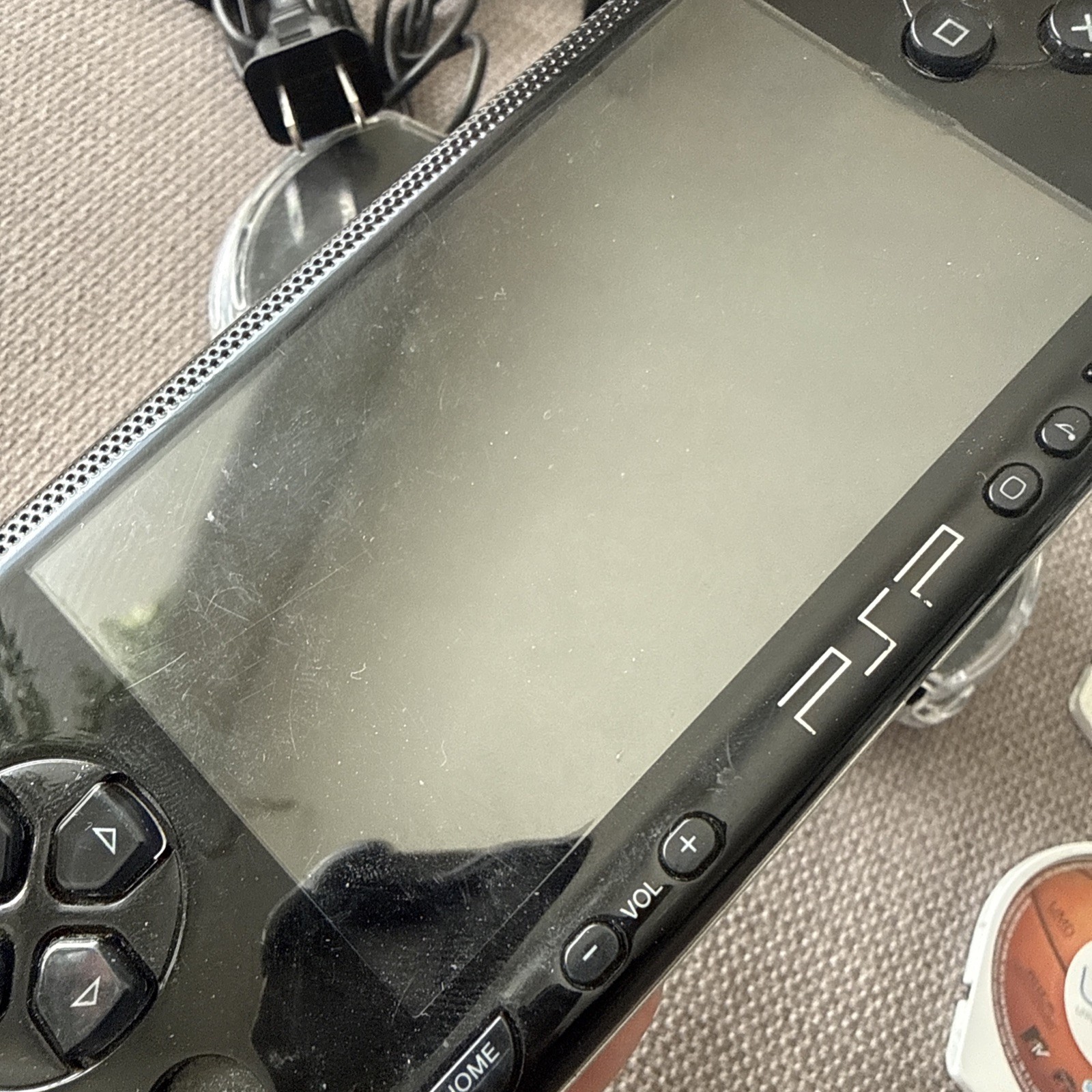 Sony PSP-1001 Black Console With Charger, 1GB Card , 11 Movies 2 Games & Case