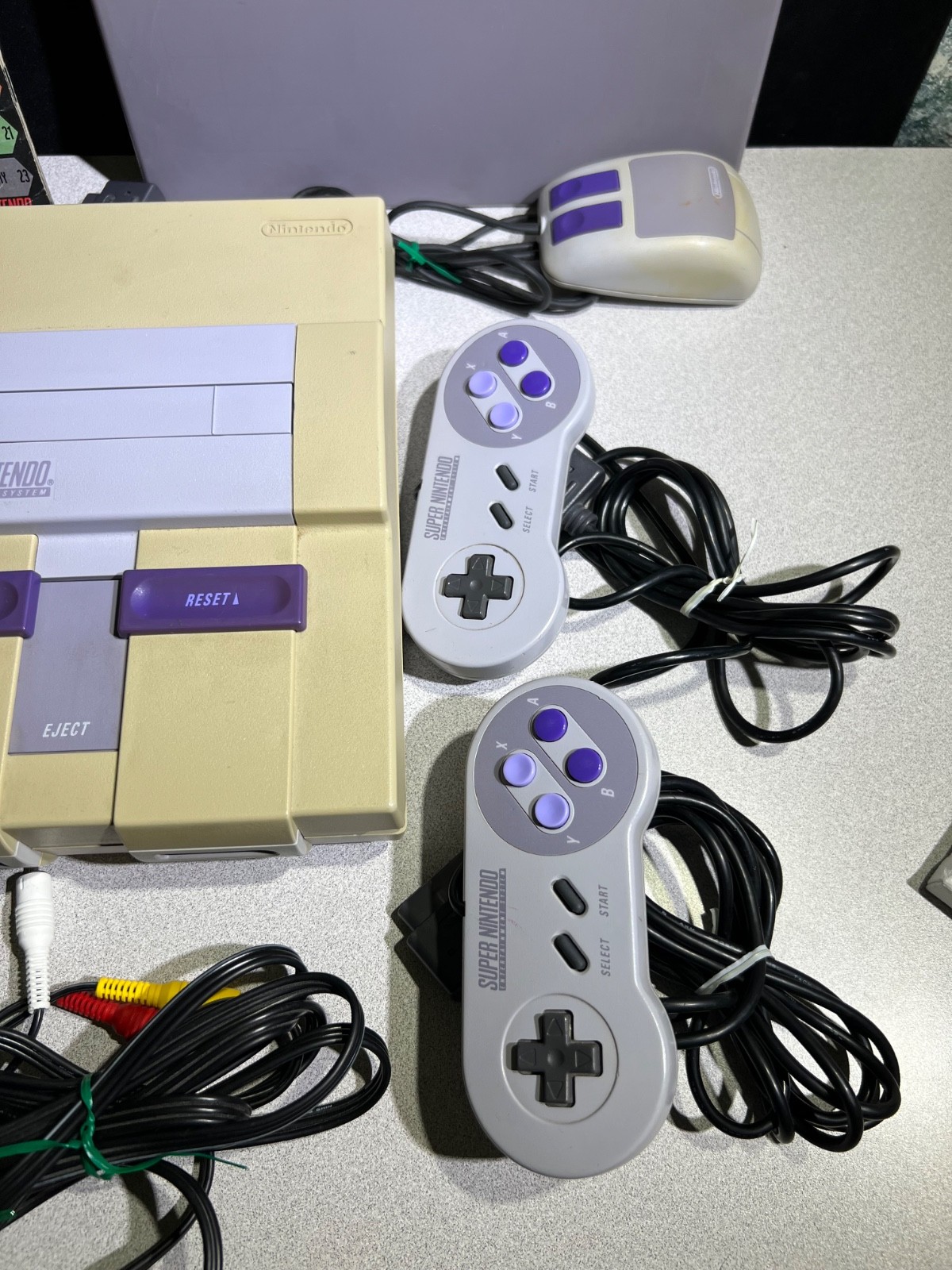 Super NES SNS-001 Console, Controllers, Paint Pad w/Mouse, Game Genie & 7 Games