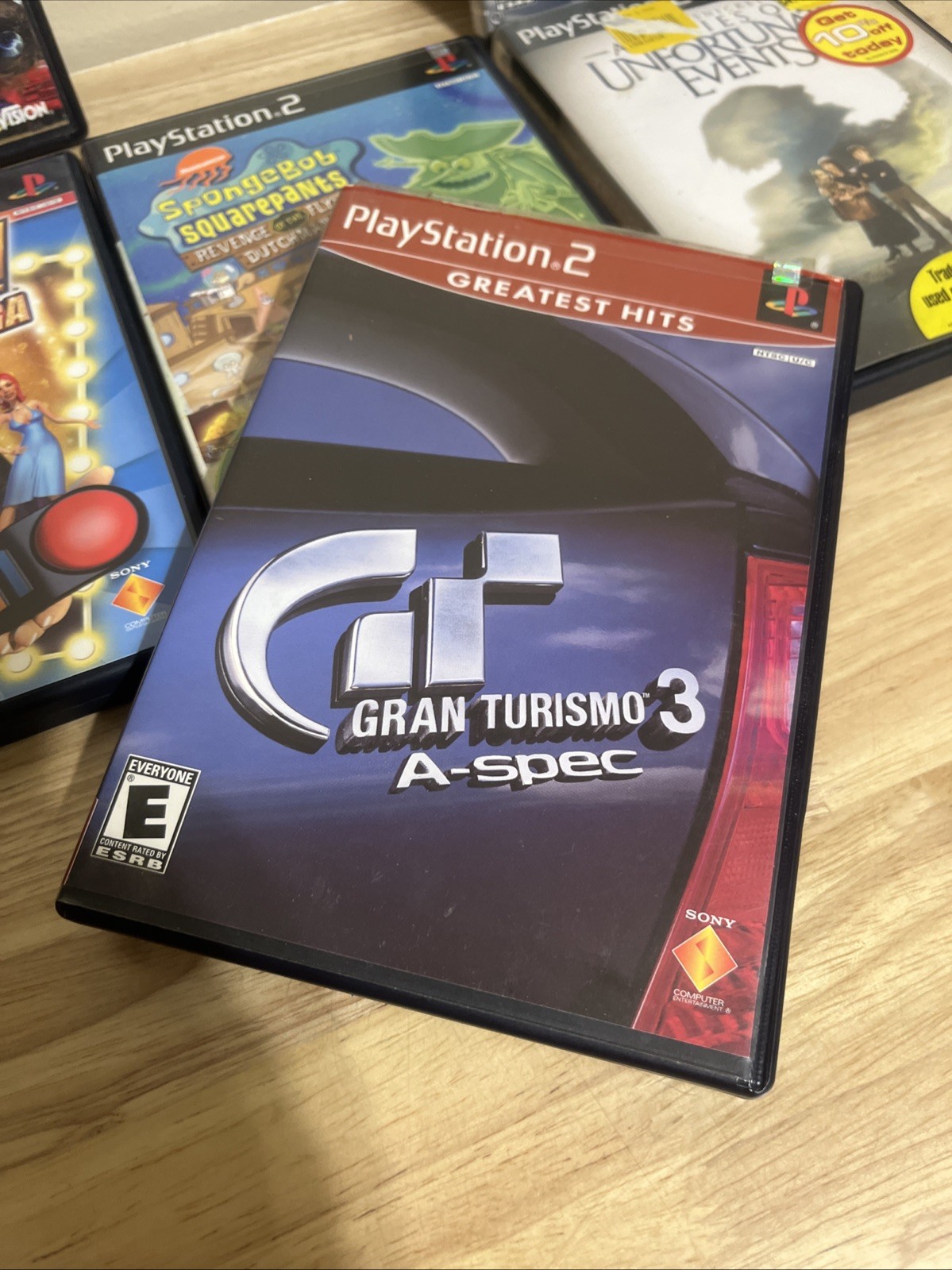 PS2 Game Lot Of 8 PlayStation 2 Crash Ratchet, Gran Turismo 3, Guitar Hero, Etc