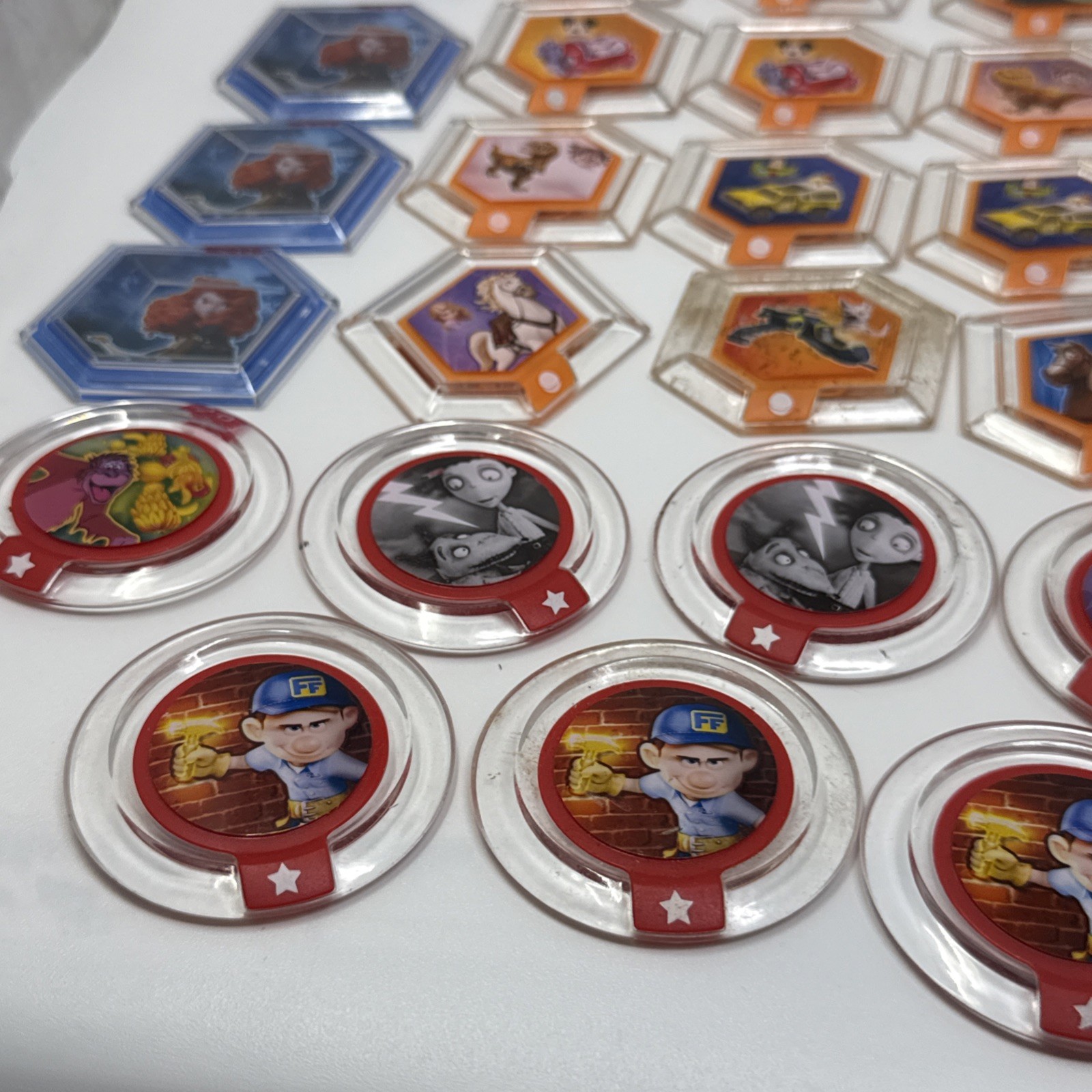 Lot Of 110 DISNEY INFINITY 2.0 3.0 Stitch Bolt Frankenweenie Brave Power Disc