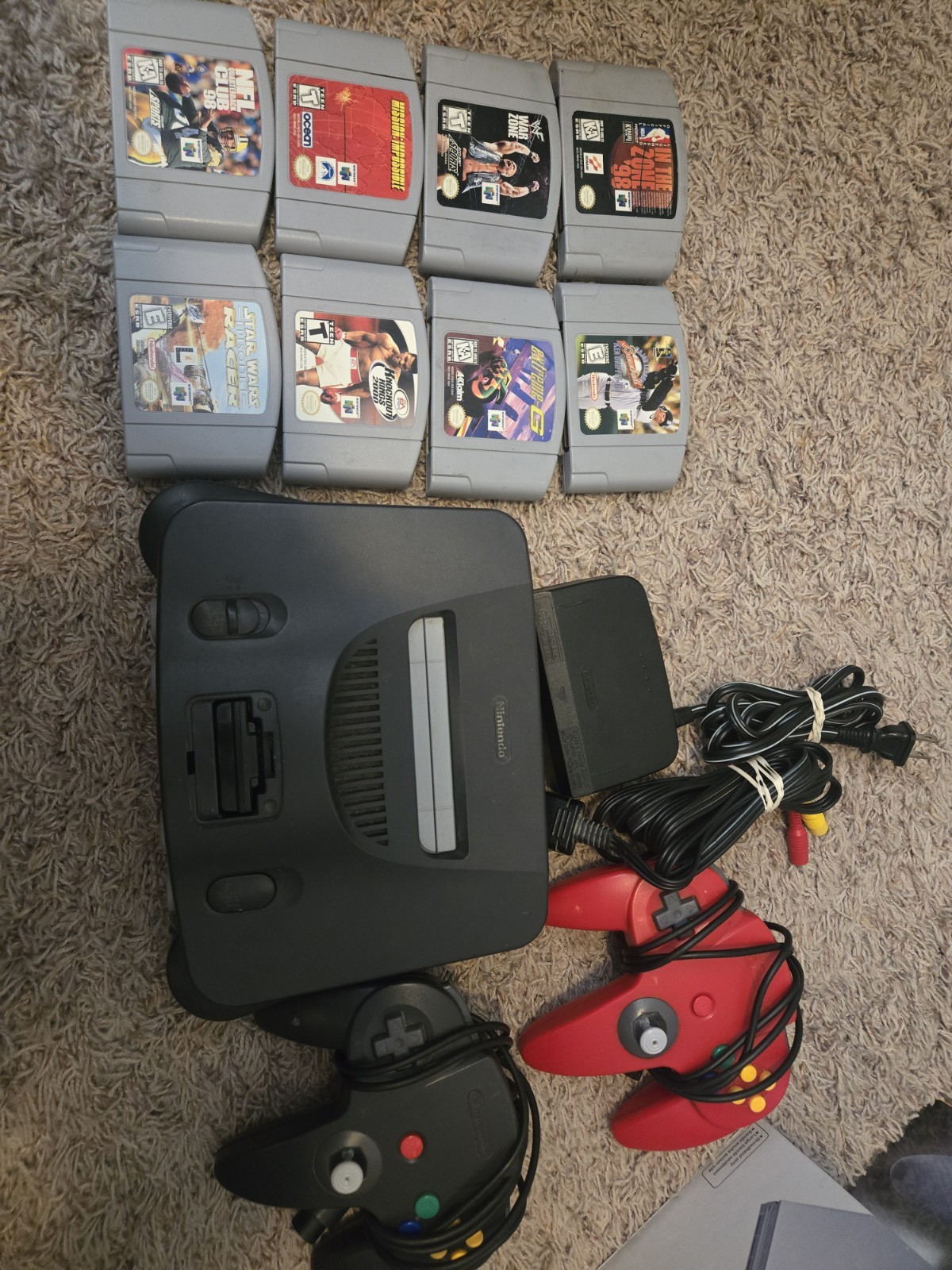 Nintendo 64 console with 8 games and 2 Controllers N64 KEN GRIFFEY WWF