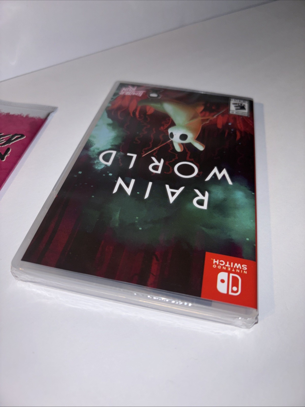 NEW RAIN WORLD U.S. ESRB & LIMITED RUN GAMES TRADING CARD BOOSTER PACK SWITCH!