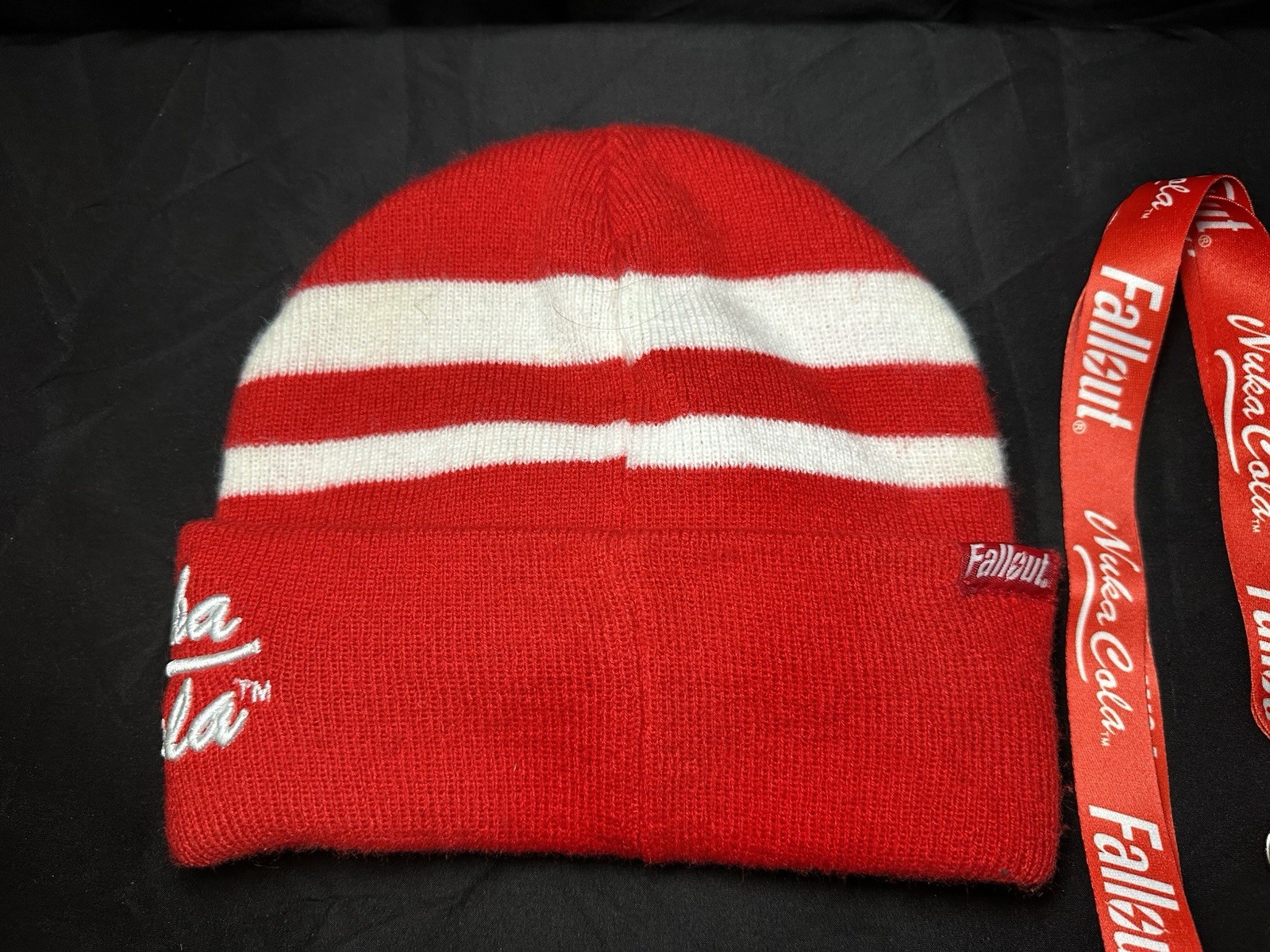 Lot of Bethesda Fallout Nuka Cola Bottle Caps, Beanie Hat, Lanyard & Keychain