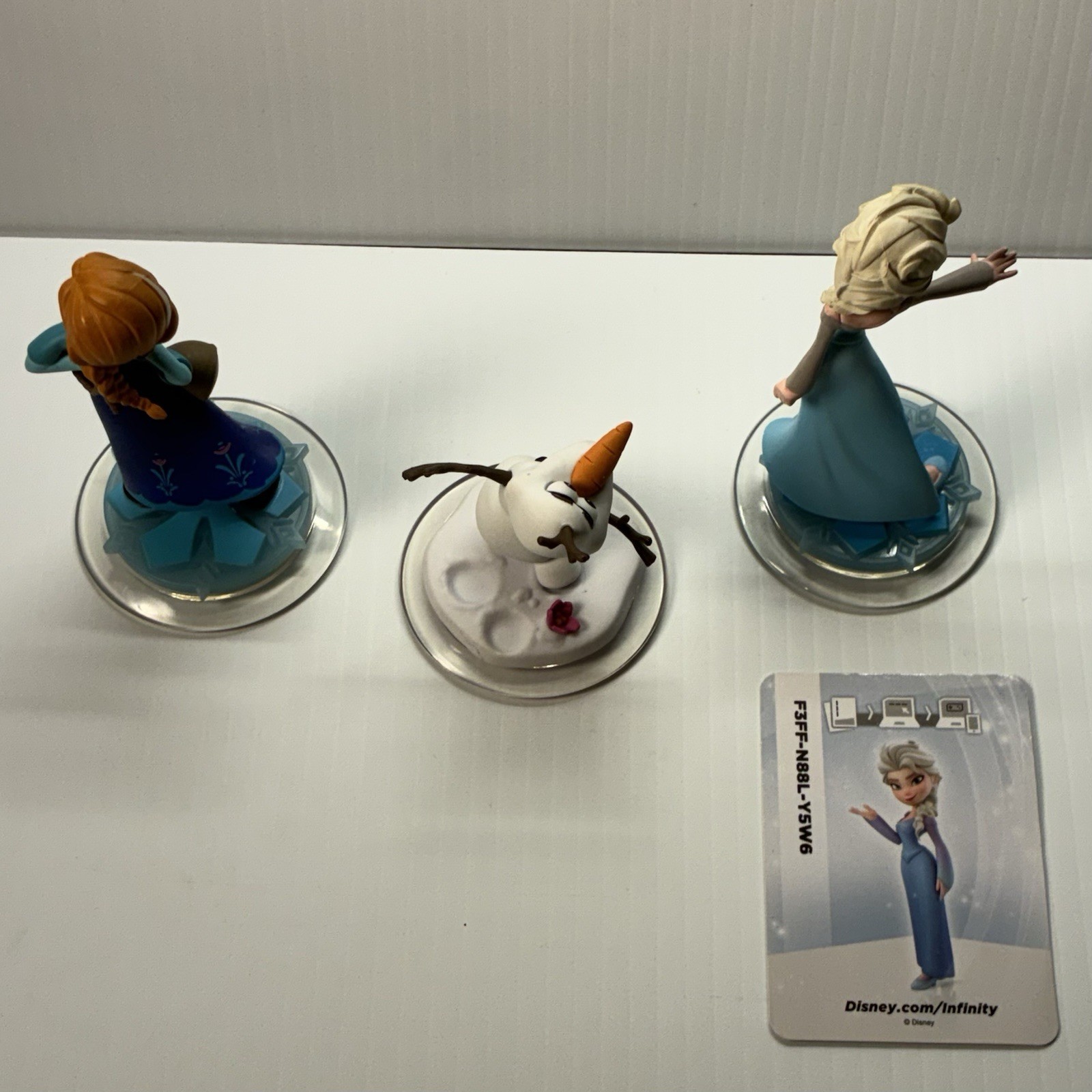 Frozen Character Set. Disney Infinity Video Game Pieces (Anna, Elsa & Olaf).
