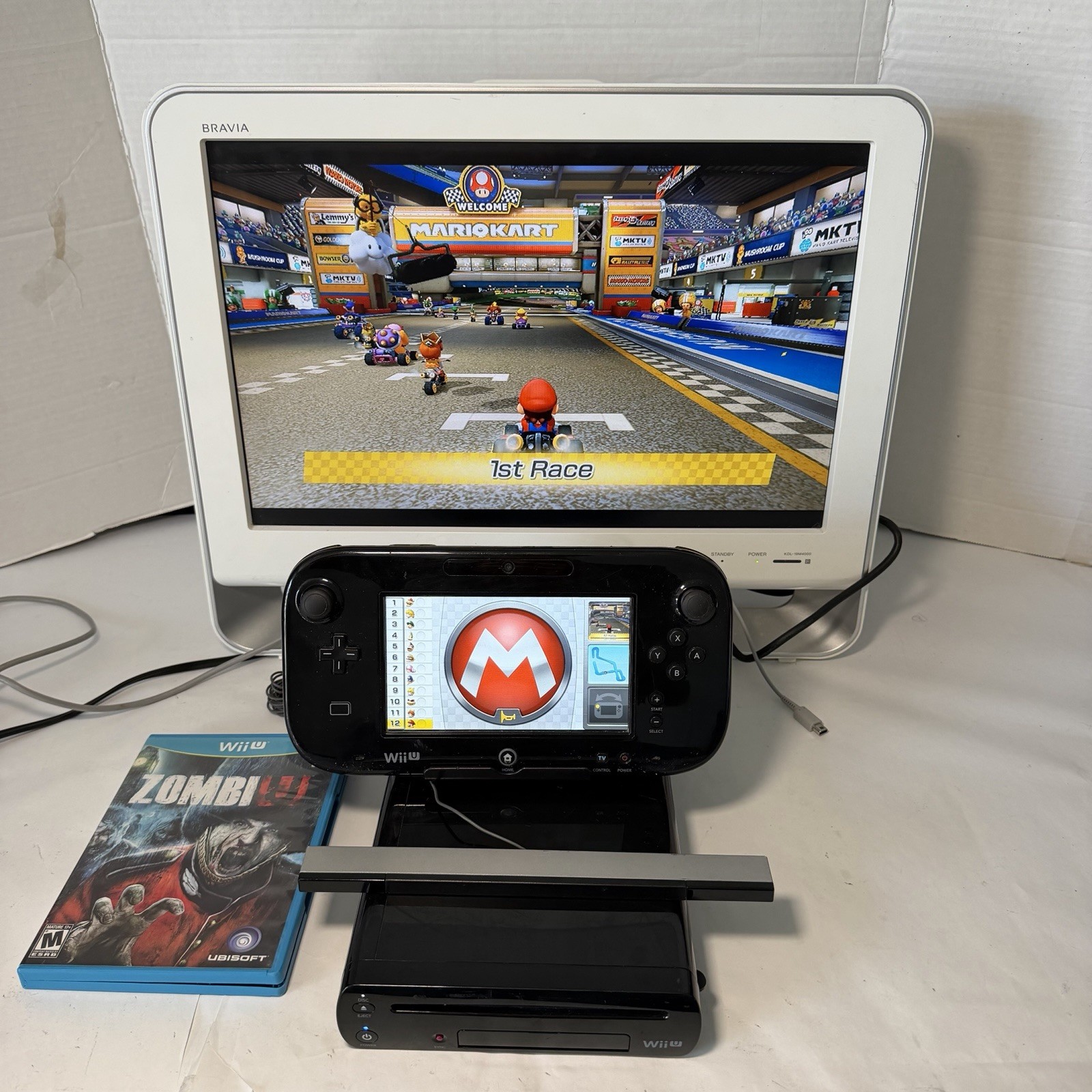 Nintendo Wii U 32GB Black Deluxe Console & Gamepad W/ Mario Kart 8 And Zombie U