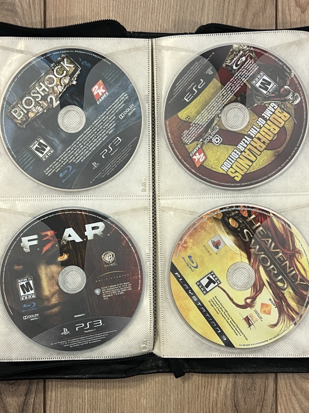 Lot Of 64 Sony Playstation 3 PS3 Disc Only Games Binder Untested Mixed Games