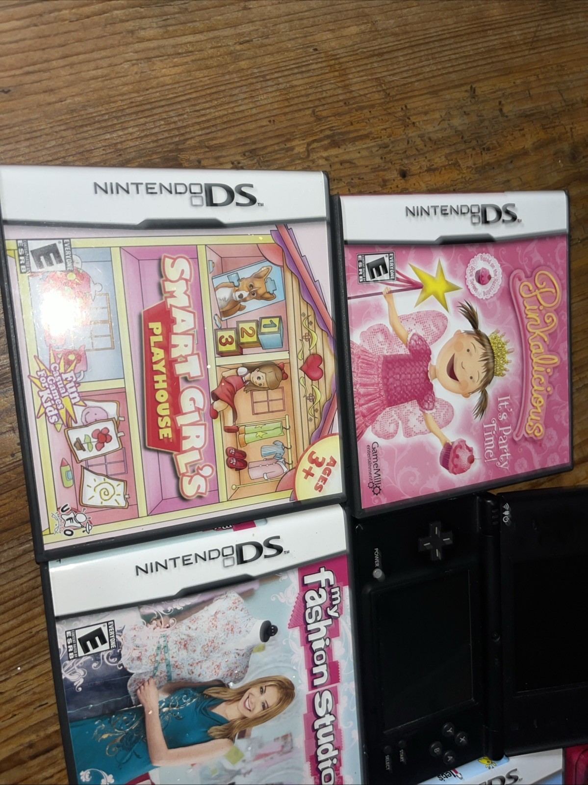 Nintendo DSi (TWL-001) 2008 Black Bundle w/ 5 Games & Carrying Case