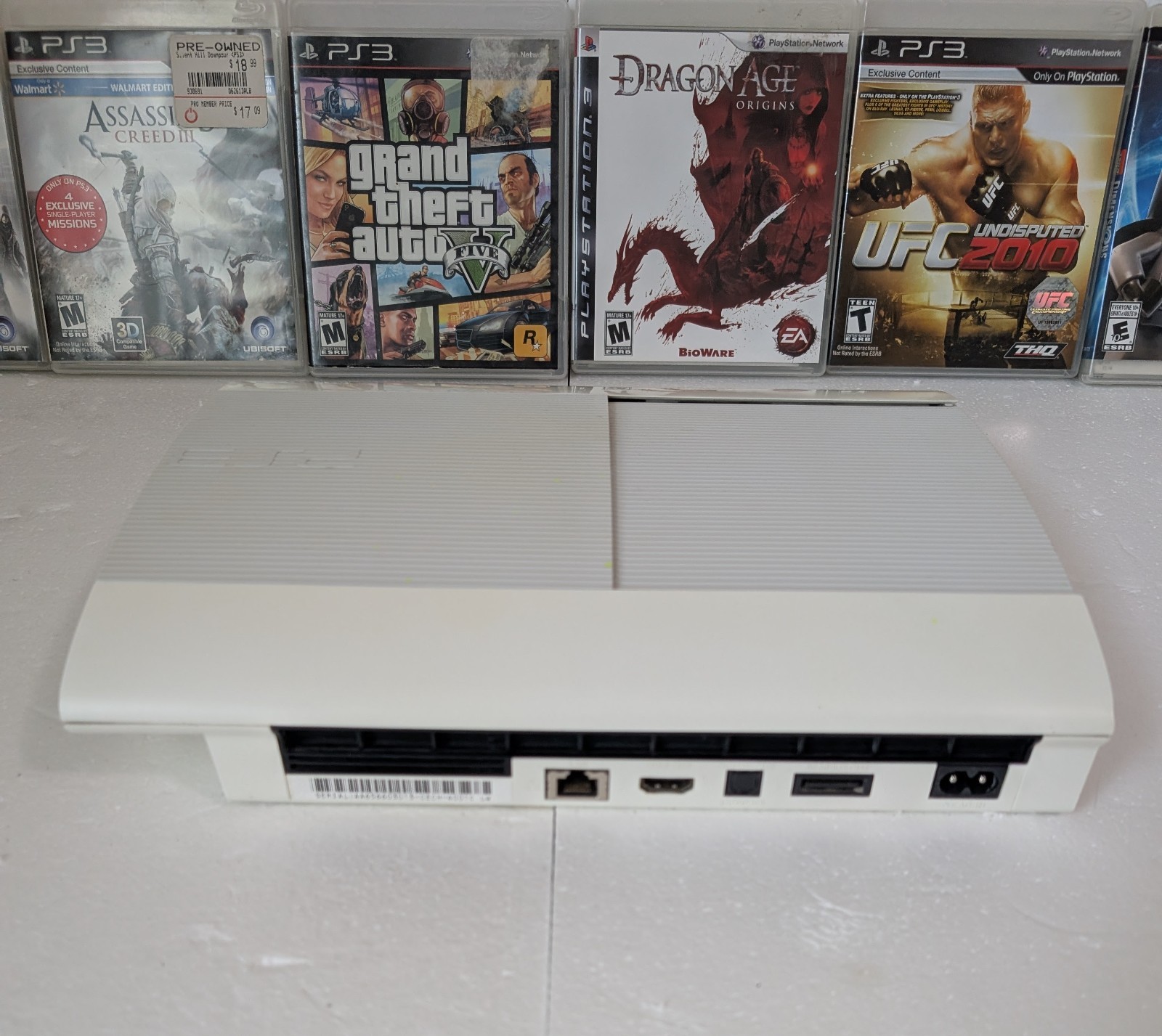 Sony PS3 Super Slim 500GB White Console Bundle 2 OEM Sony Controllers 8 Games…