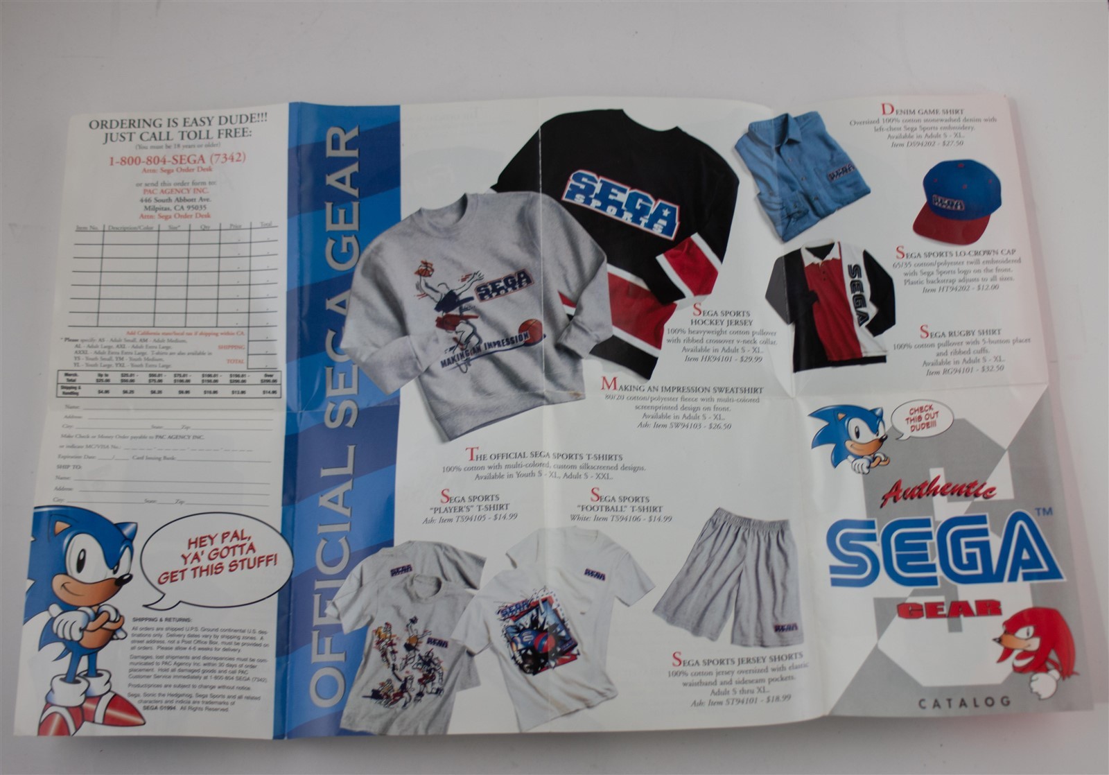 1994 Official Sega Gear Fold Out Poster Insert – Clothing, Shirts, Shorts, Watch