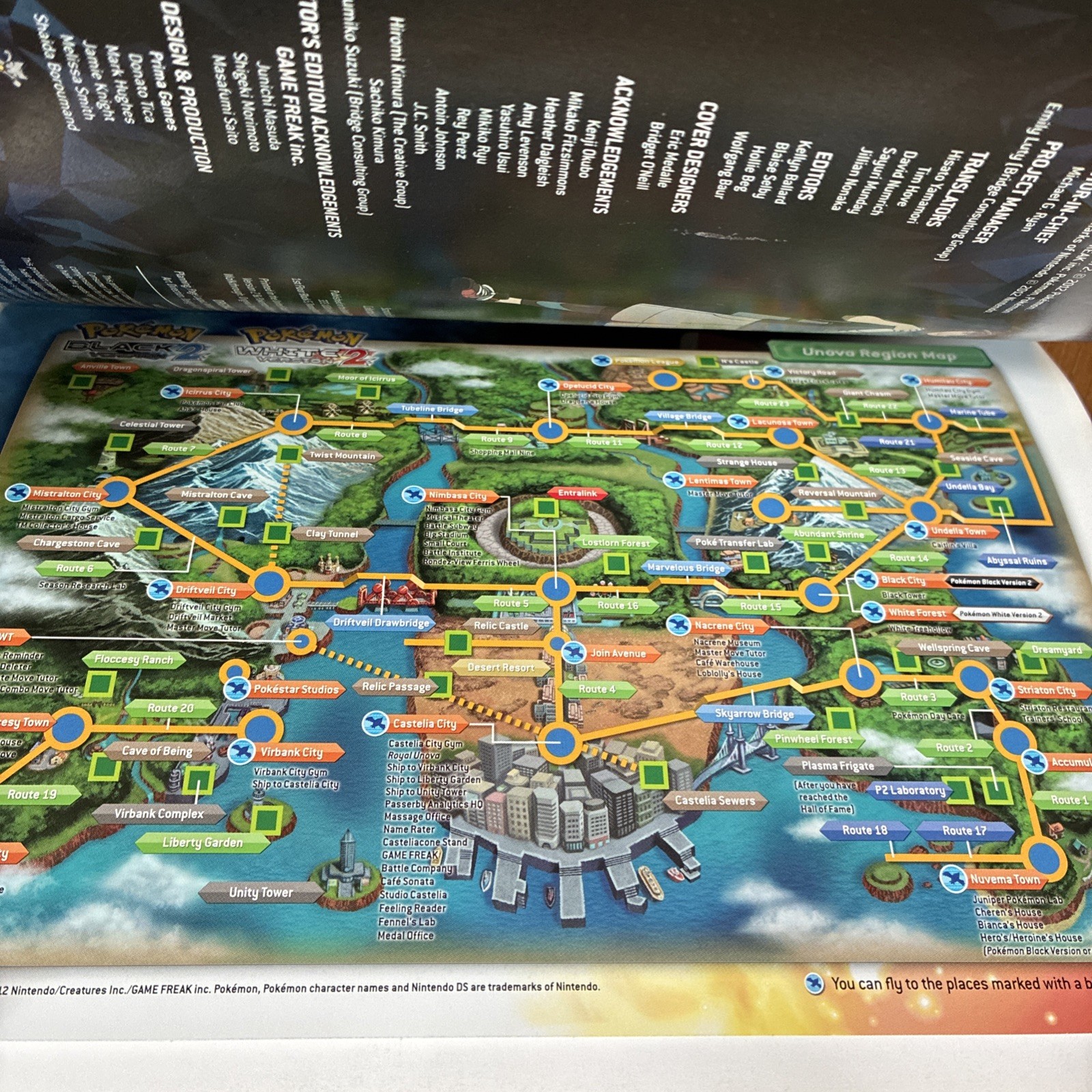 Pokemon Black and White 2 Strategy Guide with poster for Nintendo DS console