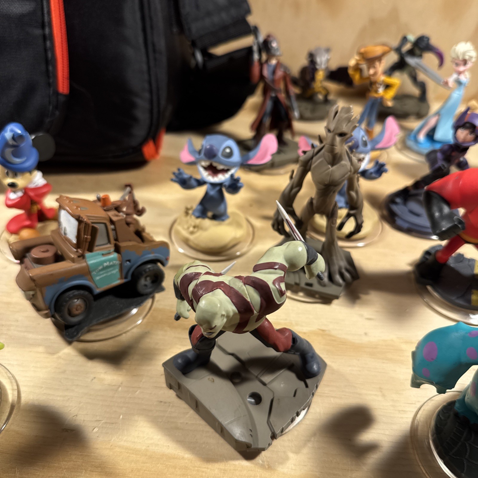 Disney Infinity Figure Lot Of 21 With Travel Bag And Discs Monsters Stitch Ralph