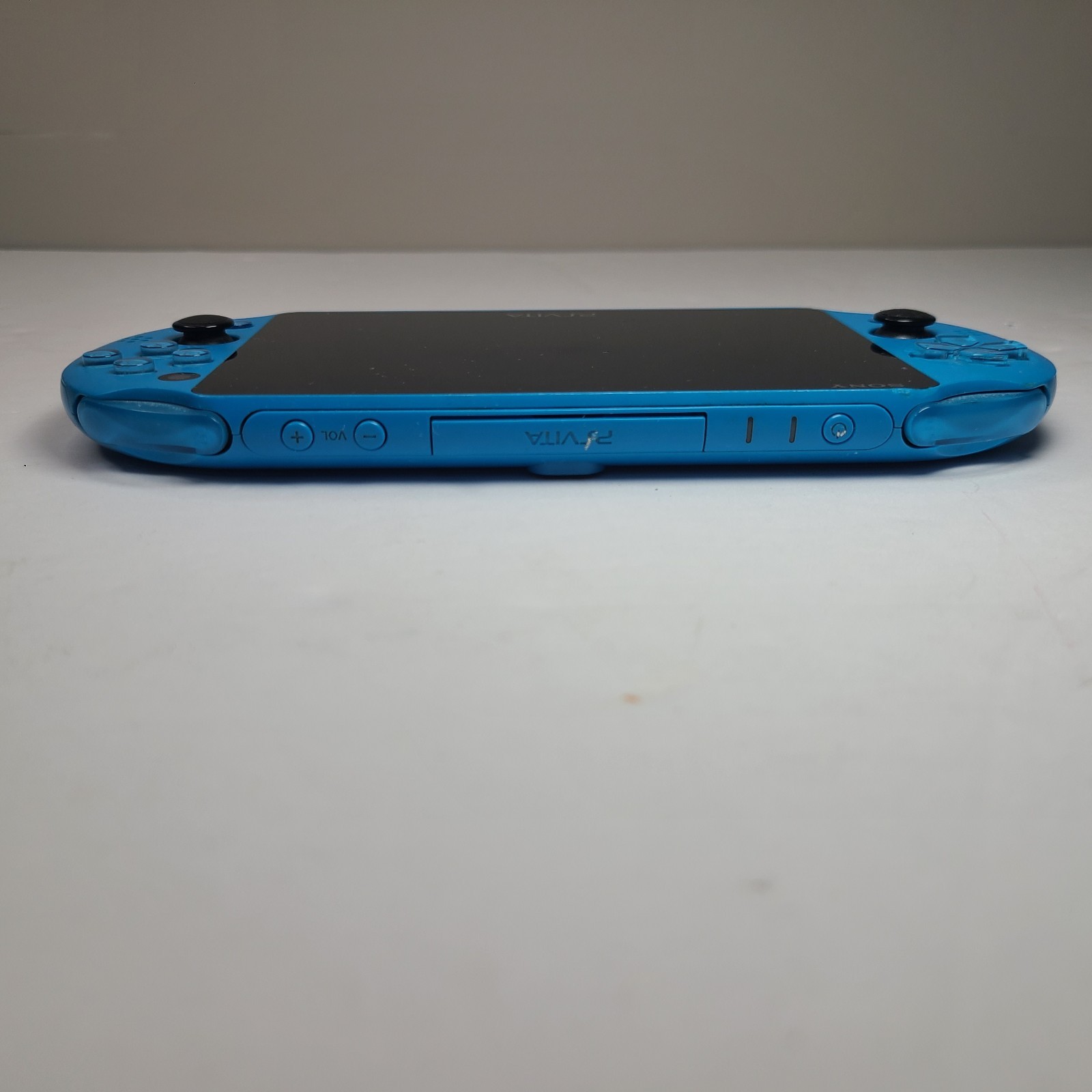Sony PS Vita PCH 2000 ZA23 Aqua Blue Slim Console W/ LEGO Jurassic World Game