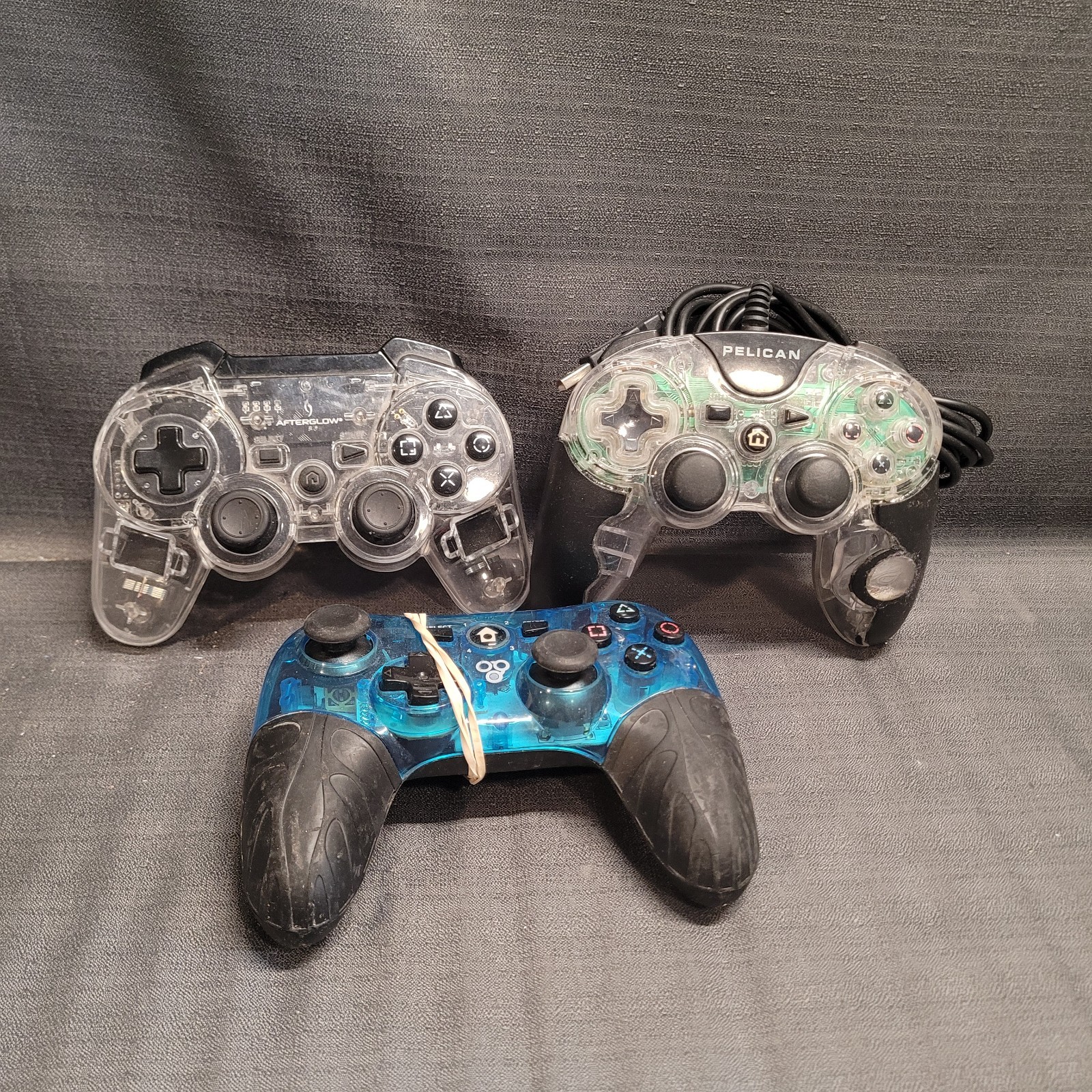 Lot of 3x Mixed lot of 3rd Party Controllers for the Playstation 3 PS3