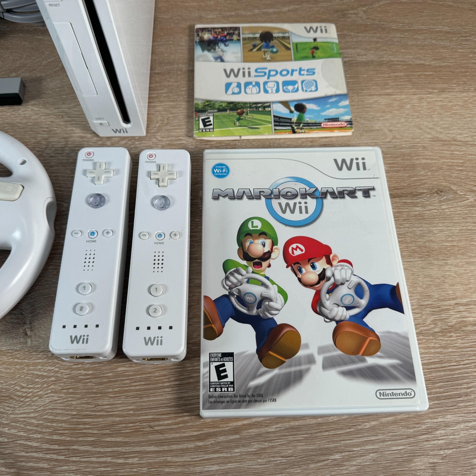 Nintendo Wii Console Mario Kart Bundle with Wii Sports, 2 Controllers & 2 Wheels