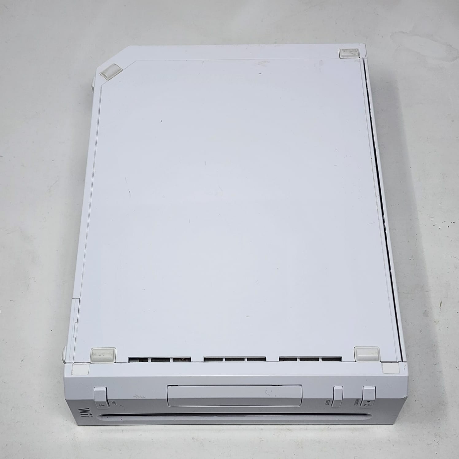 White Nintendo Wii + OEM Wii-Mote & Nunchuck + 2 Games – Tested
