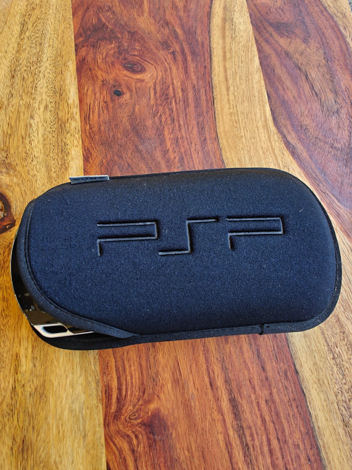 Sony PSP 1001 Console BLACK – Tested & Working – Includes OEM Sony Soft Case