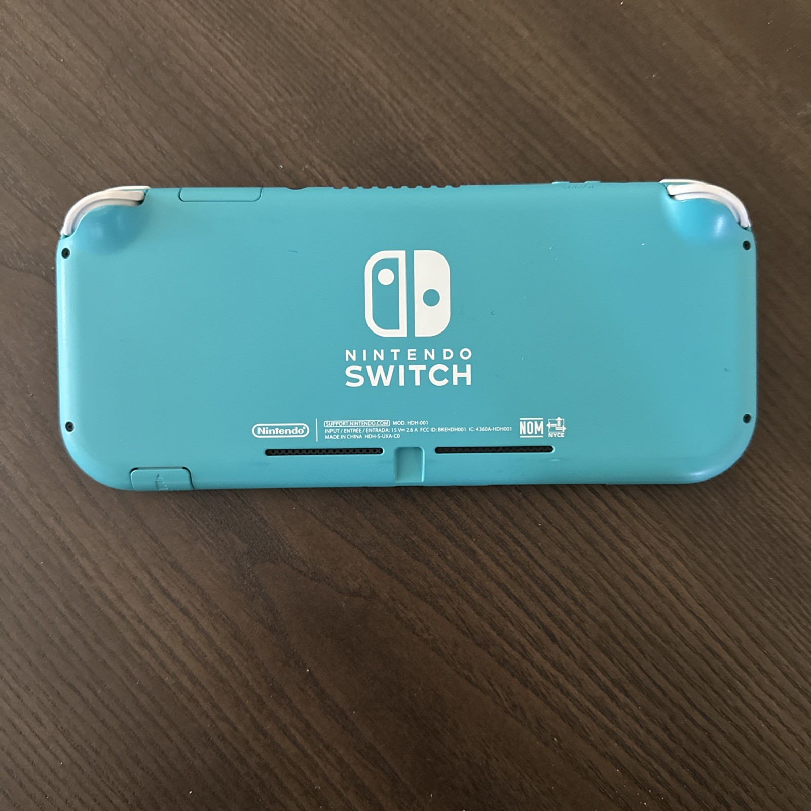 Nintendo Switch Lite – Turquoise Case and Charger included