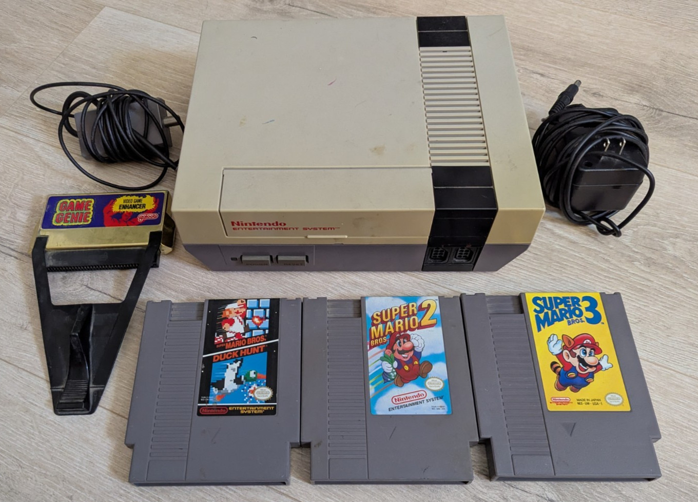 Original Nintendo NES Entertainment System w/ Super Mario Bros 1-3 & Game Genie