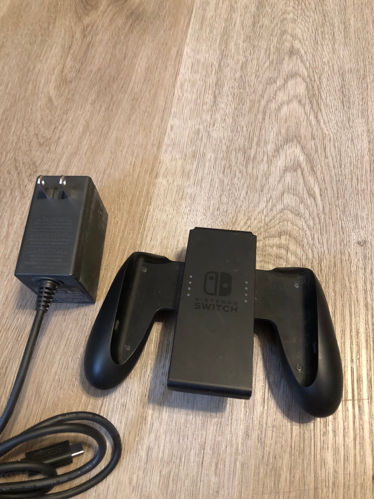 Nintendo Switch AC Adapter Model HAC-002(USZ). Tested with bonus grip HAC-011