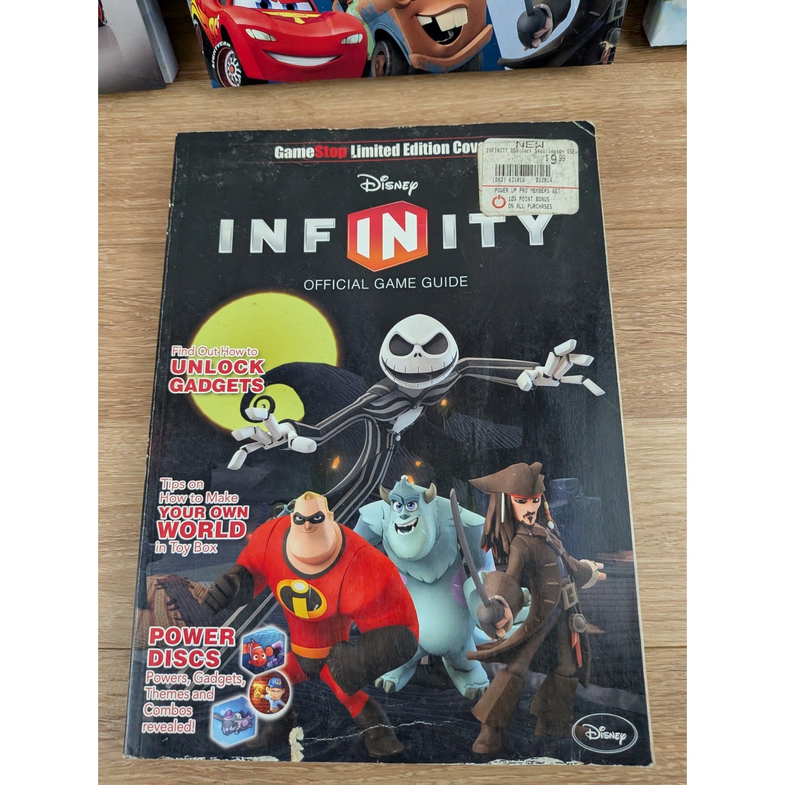 Disney Infinity Power Disc Albums Incomplete & GameStop Game Guide Bundle