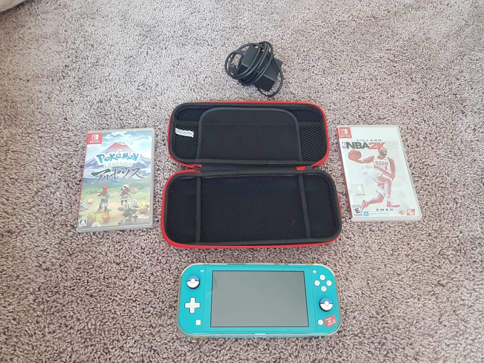 Nintendo Switch Lite (with games and accessories)