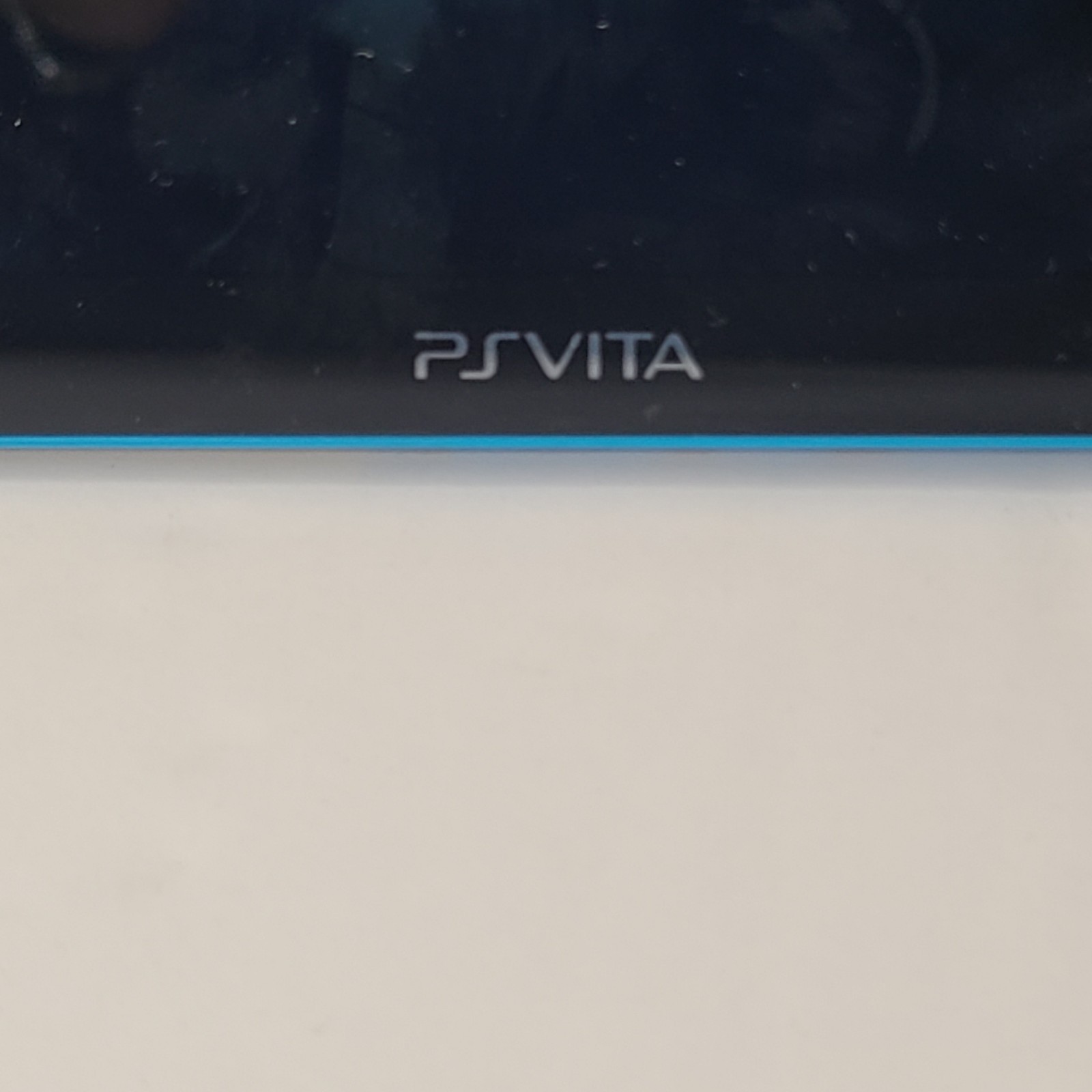 Sony PS Vita PCH 2000 ZA23 Aqua Blue Slim Console W/ LEGO Jurassic World Game