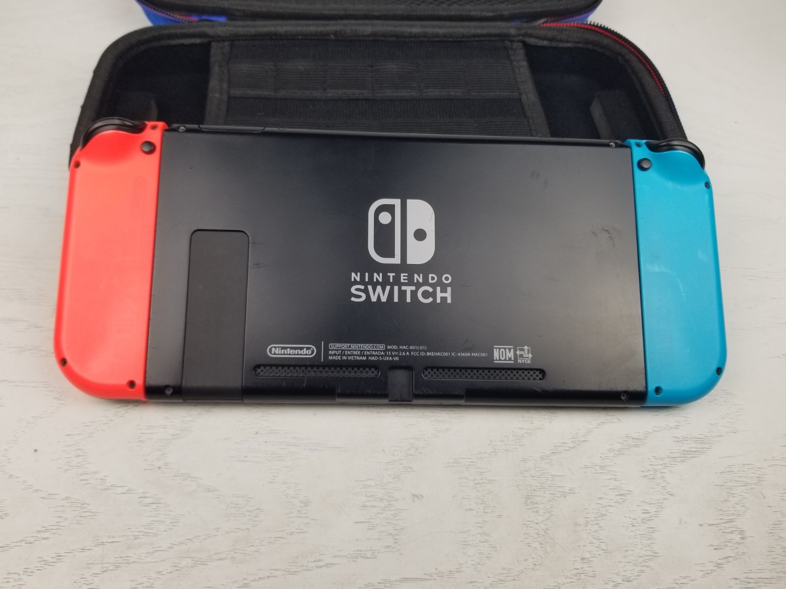 Nintendo Switch with Neon Blue and Neon Red Joy-Con (HAC-001-01) With Case