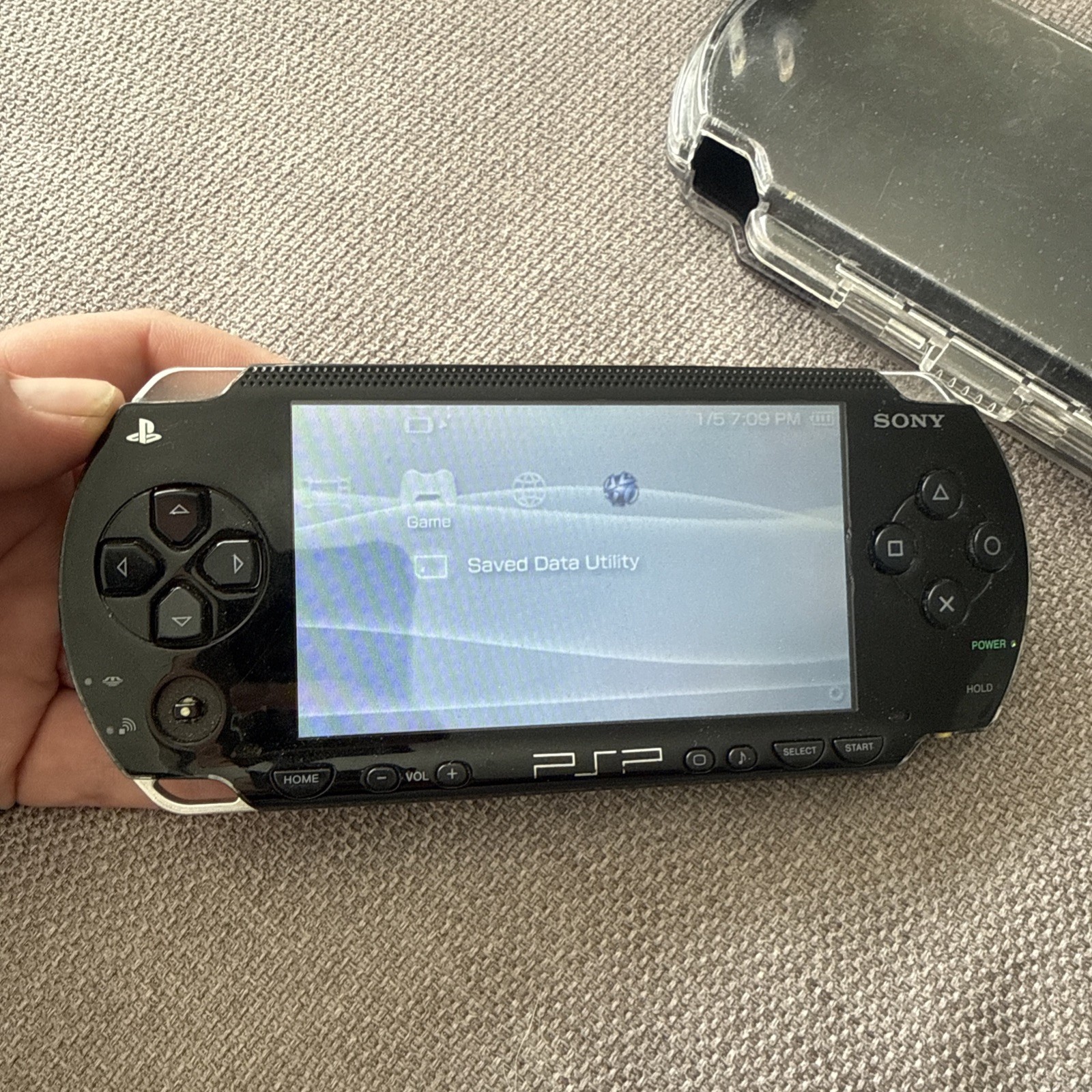 Sony PSP-1001 Black Console With Charger, 1GB Card , 11 Movies 2 Games & Case