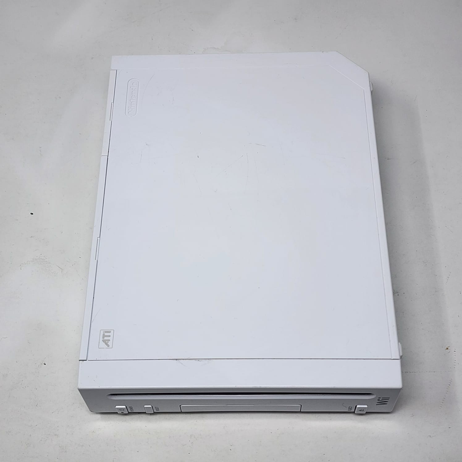 White Nintendo Wii + OEM Wii-Mote & Nunchuck + 2 Games – Tested